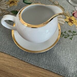 Elegant White and Gold Creamer with Saucer